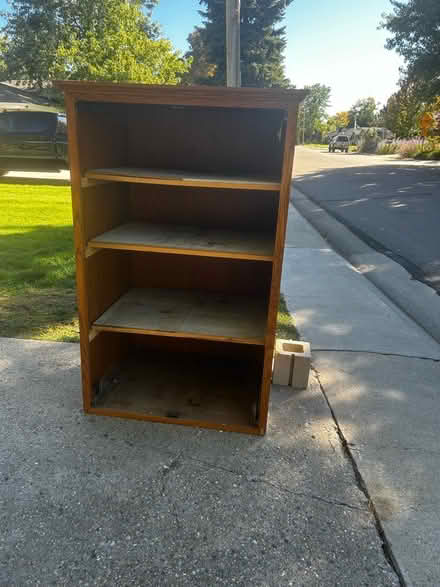 Photo of free Shelf unit and 1/2 cinder block (North Lakewood) #1