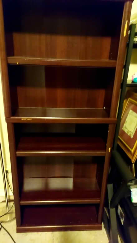 Photo of free Tall book shelf (Snellville) #1
