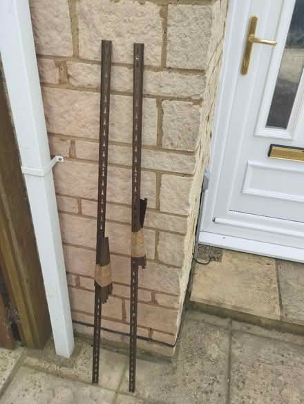 Photo of free Two shelving uprights and six brackets (Thorney Leys OX28) #1
