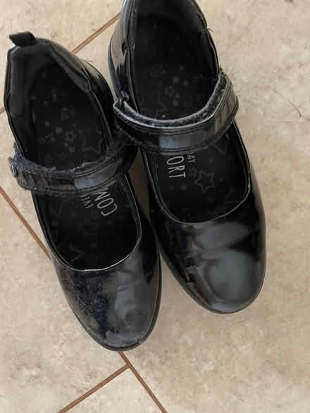 Photo of free Girls black school shoes size 12 (Eastfield) #1