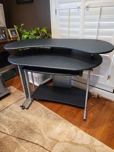 Photo of free Work desk, light, rolls (Potomac, MD) #1