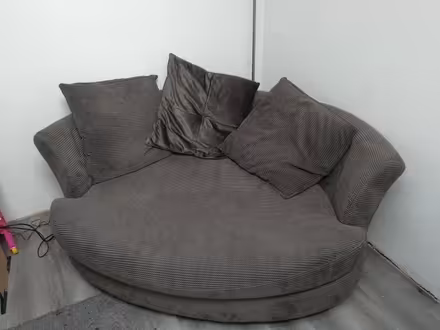 Photo of free 2 large grey fabric sofas smke (East grinstead, Furzefield) #2