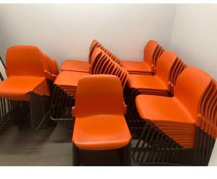 Photo of free Approx 75 plastic orange chairs (Shirley Croydon) #1