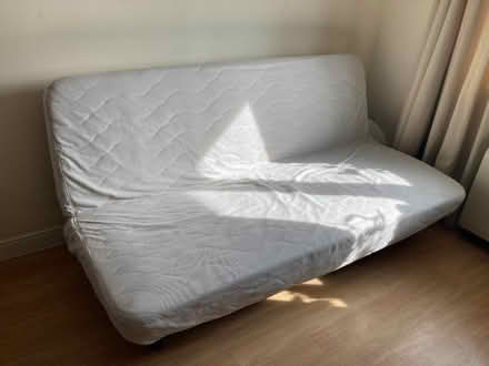 Photo of free 3 seater IKEA sofa bed, opens to double bed, beige cover (Balham SW17) #1