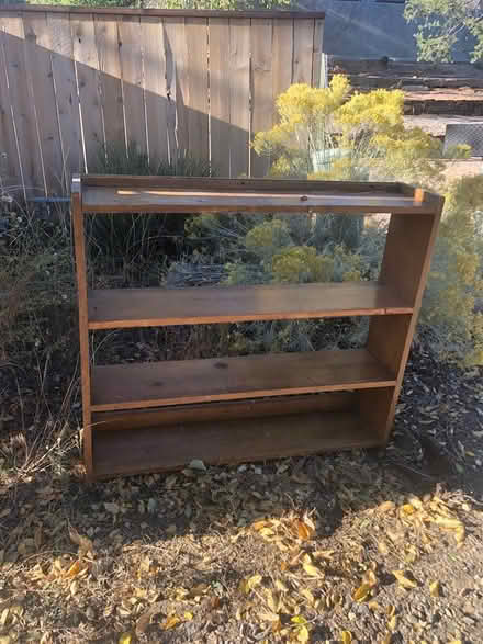 Photo of free Solid wood bookshelf (Casa Solana, near Co-Op) #1