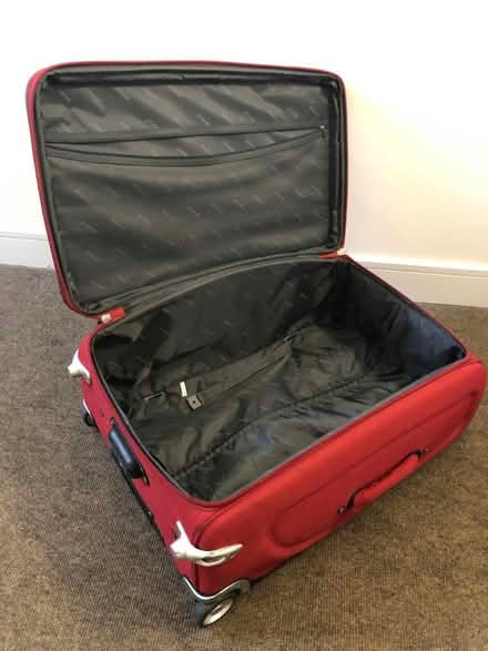 Photo of free Large red suitcase (Dun Laoghaire, Dublin) #2