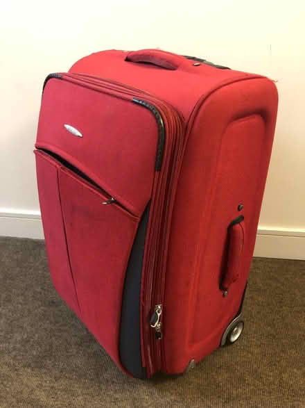 Photo of free Large red suitcase (Dun Laoghaire, Dublin) #3