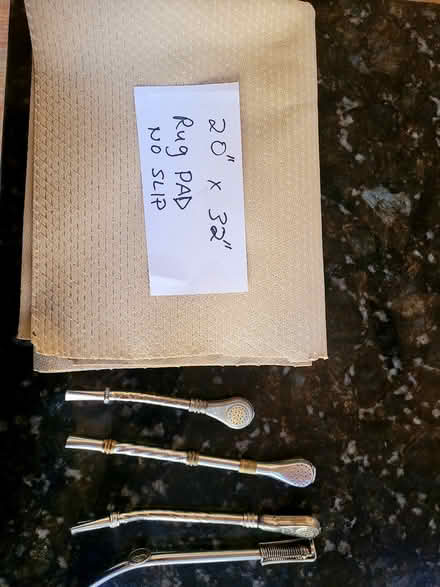 Photo of free Non slip rug pad & mate bombillas (mohegan lake, ny) #1