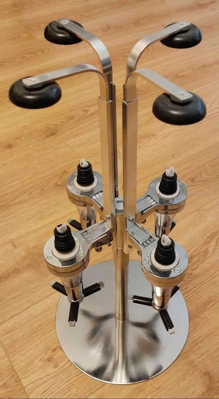 Photo of free 4 Bottle Revolving Optic Stand (Heaton Chapel SK4) #1
