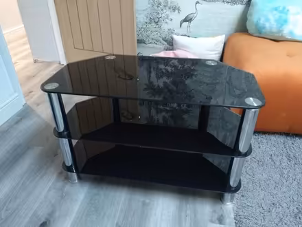 Photo of free Black glass TV stand (East grinstead, Furzefield) #1