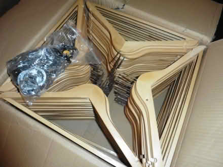 Photo of free 2 boxes of wooden security hangers. (Bedford MK40) #2