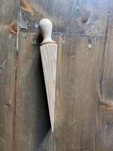 Photo of free Wooden wedge doorstop (SO22 winchester) #1