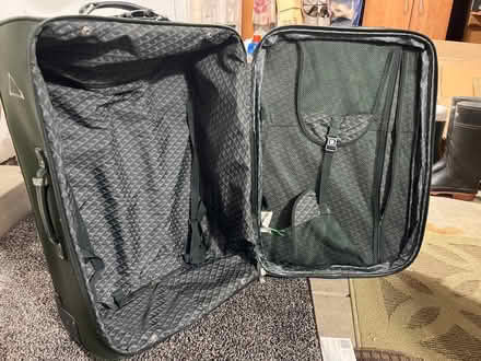 Photo of free Medium luggage, no rubber on wheels (94086) #1