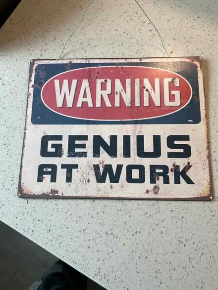 Photo of free Genius at work- metal sign (Charminster) #1