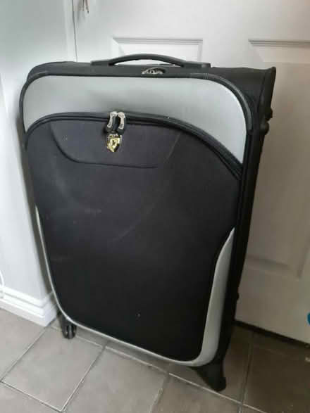 Photo of free Large black suitcase (Garston L19) #1