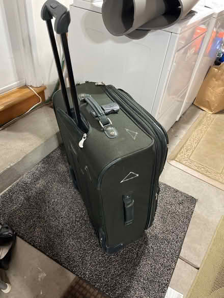 Photo of free Medium luggage, no rubber on wheels (94086) #2