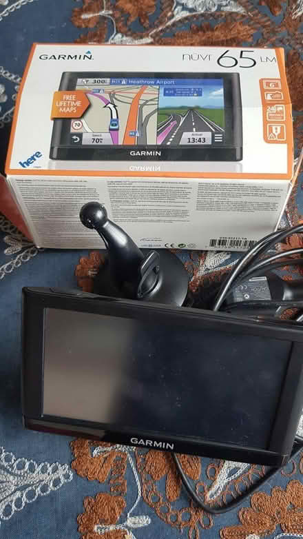 Photo of free Garmin Satnav with holder and cable (Tottenham N17) #1