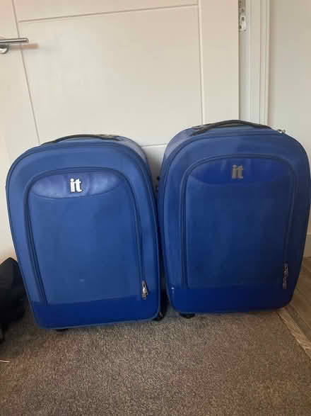 Photo of free Two large blue suitcases (BH17 Broadstone) #1