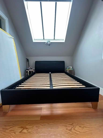 Photo of free King sized bed frame with faux leather head board (Barnes SW13) #1