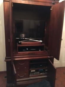 Photo of free Solid wood entertainment center/cabinet #1