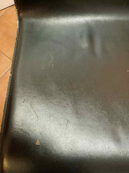 Photo of free Two black leather dining chairs (Saltaire BD18) #2