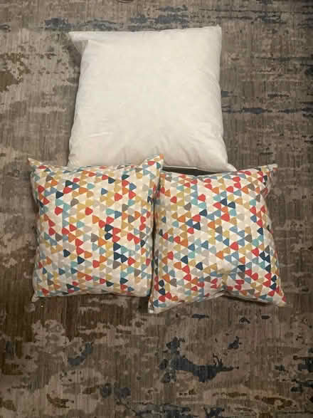 Photo of free 3 feather cushions (Nottinghill) #1