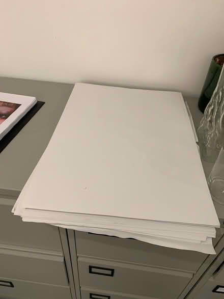 Photo of free Stack of premium poster paper (Great Portland Street W1W) #1