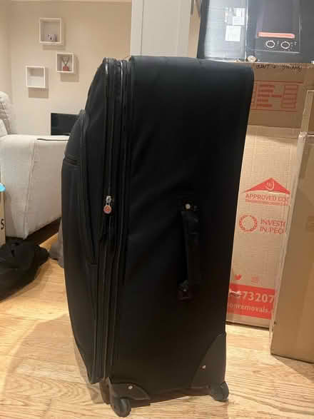 Photo of free Large black suitcase (Cumnor OX2) #2