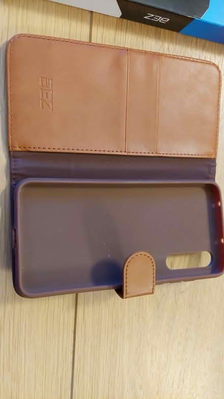 Photo of free Pristine phone cover (RH12) #1