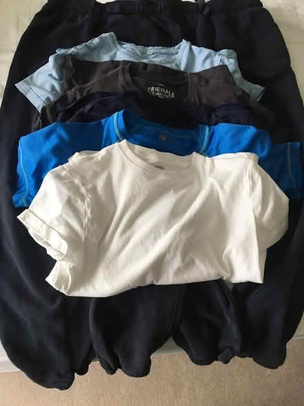 Photo of free 2 pairs of tracksuit bottoms and various t -shirts.Age 10-11 (West Oxfordshire OX29) #1