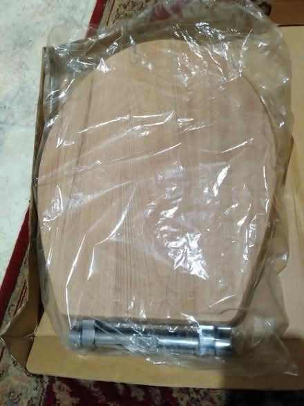 Photo of free NEW walnut toilet seat (Amber Valley DE56) #1