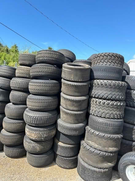 Photo of free Used golf cart tires and/or rims (1590 Tamiami Trl S, Venice) #1
