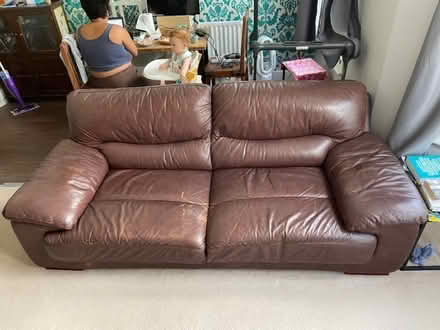 Photo of free 2 x DFS 'Dazzle' leather sofas with wooden feet (East Sheen SW14) #2