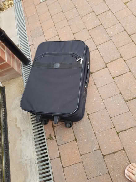 Photo of free Medium and large travel suitcases. 2 wheels (Meppershall SG17) #3