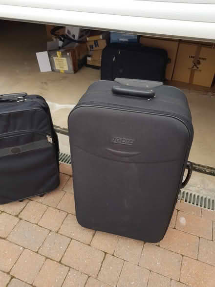 Photo of free Medium and large travel suitcases. 2 wheels (Meppershall SG17) #2