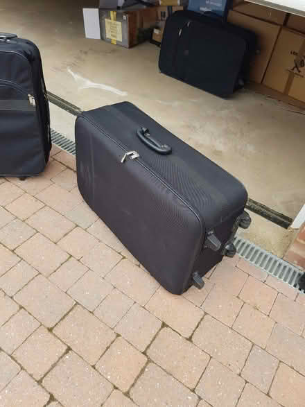 Photo of free Medium and large travel suitcases. 2 wheels (Meppershall SG17) #4