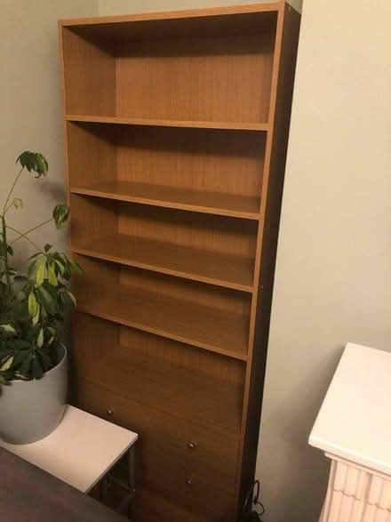 Photo of free Tall shelving unit with drawers (LS27, Churwell) #1