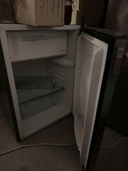 Photo of free John Lewis under the counter fridge/freezer (Swindon SN25) #1