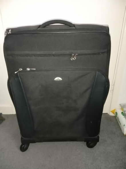 Photo of free Black suitcase (Surrey Heath GU15) #2