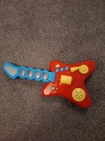 Photo of free Toy guitar (Woodley RG5) #1