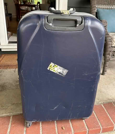 Photo of free Large rolling suitcase (San Rafael-- Bret Harte) #1