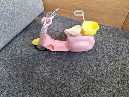Photo of free Barbie type dolls, helicopter and scooter. (Woodley RG5) #1