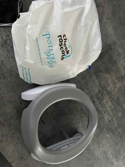 Photo of free Portable potty with bags (Epsom, KT19) #1