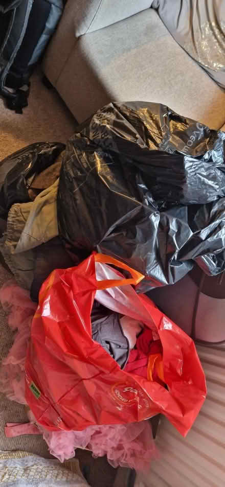 Photo of free Two bin bags of men's clothes, next etc. jeans, shirts etc (Belvidere SY2) #1