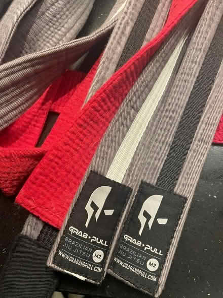 Photo of free Jiujitsu martial arts belts, red, grey/white and grey/black (Bevendean BN2) #1