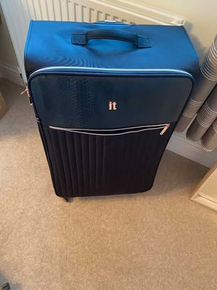 Photo of free Large Suitcase (West Common AL5) #1