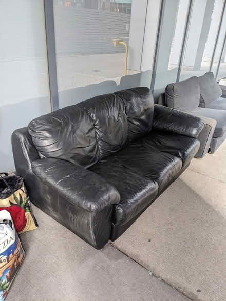 Photo of free Good condition black leather sofa (Toronto (downtown)) #1