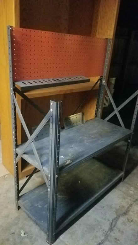 Photo of free Metal shelf w peg board (Ashland and River Street) #1