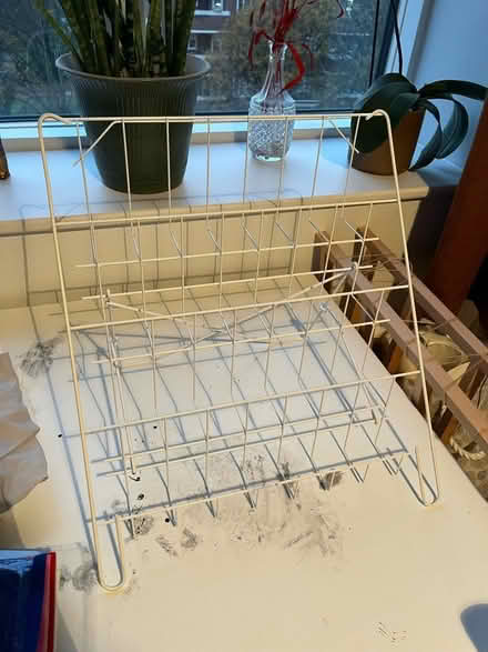 Photo of free White metal card display stand (Homerton, E9) #1