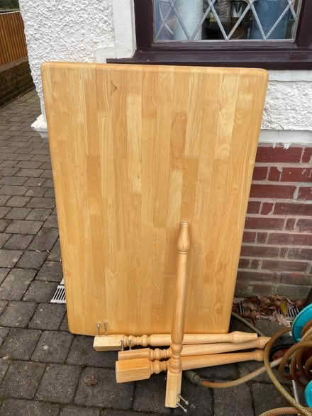 Photo of free Pine table Nice sturdy table Fits 4 easily (Rishton BB1) #1